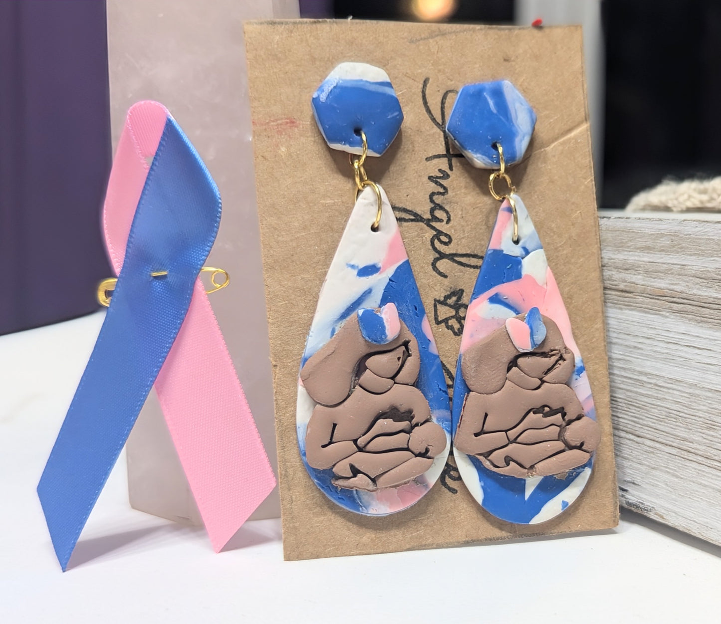 Nursing with pink and blue butterfly