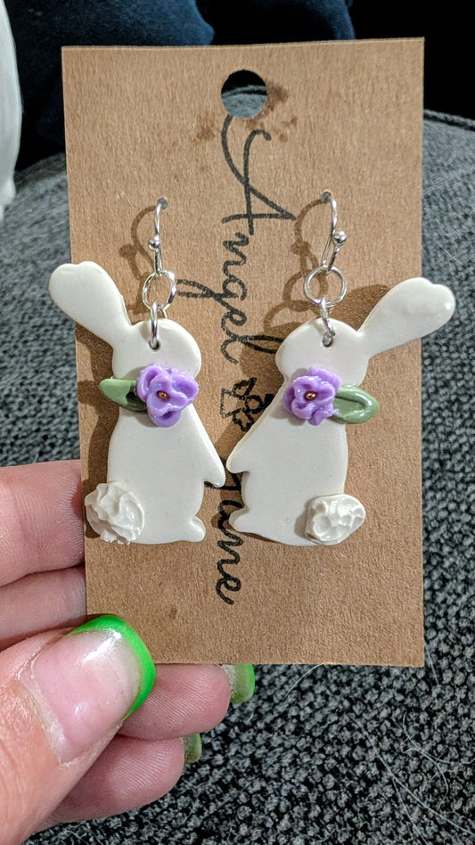 Hoppy bunny with purple flower