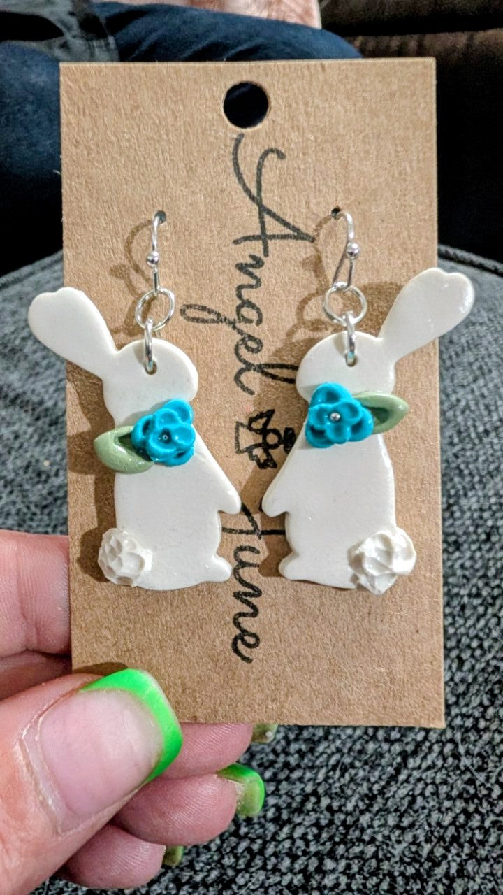 Hoppy bunny with blue flowers